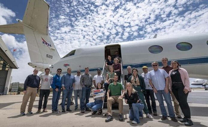 The BioSCape team is poctured with NASA and South African aircraft. Image Credit: Jeremey Shelton/Fishwater Films