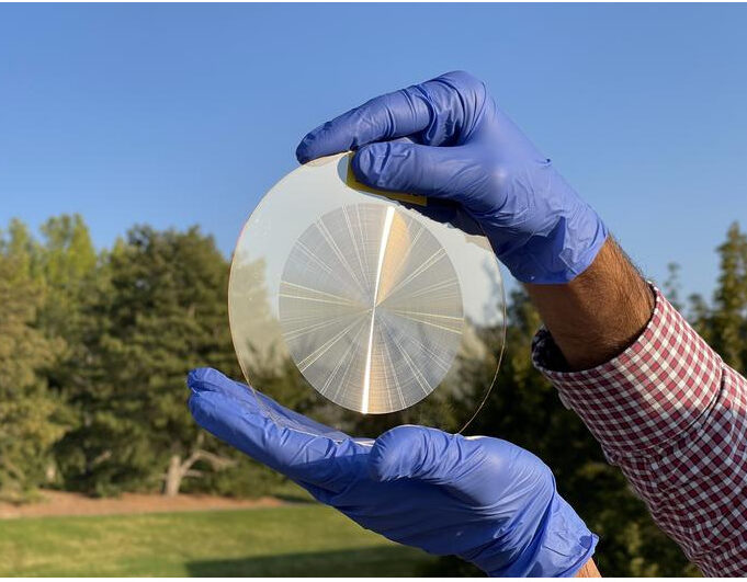 Utah researchers demonstrated the capabilities of their flat lens with test images of the sun and moon. Image Credit: Menon Lab, University of Utah