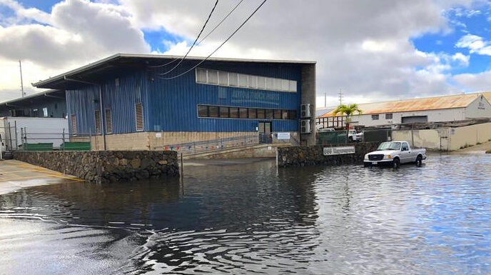 Flooding in the low-lying Mapunapuna industrial area on O'ahu, Hawai'i. Image Credit: Hawaiʻi Sea Grant King Tides Project.