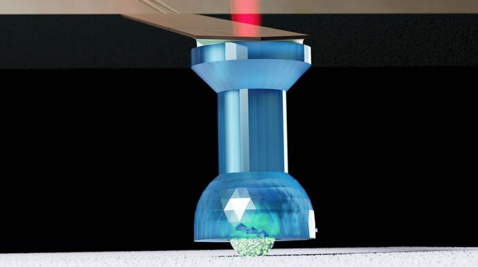 The measuring tip of an atomic force microscope with a specially designed holder in which a spherical particle is “trapped”. Credit: Simon Scherrer / ETH Zurich