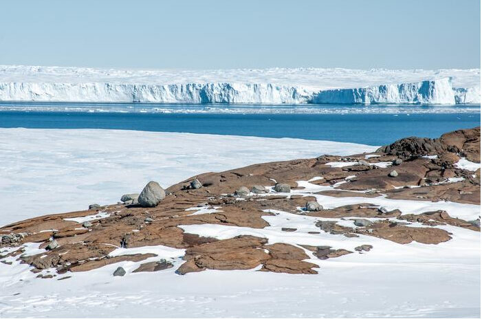 Vanderford Glacier and bedrock (R. Jones).jpg