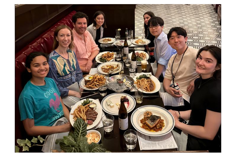 Members of the Wheeler lab are out having dinner in Boston in early 2024.